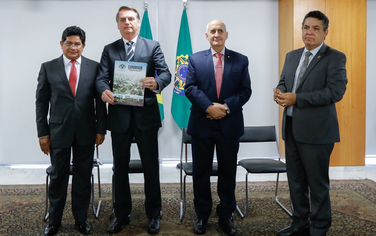 Gilmar Santos e Arilton Moura, citados em áudio de ministro, em evento oficial do governo ao lado de Bolsonaro 